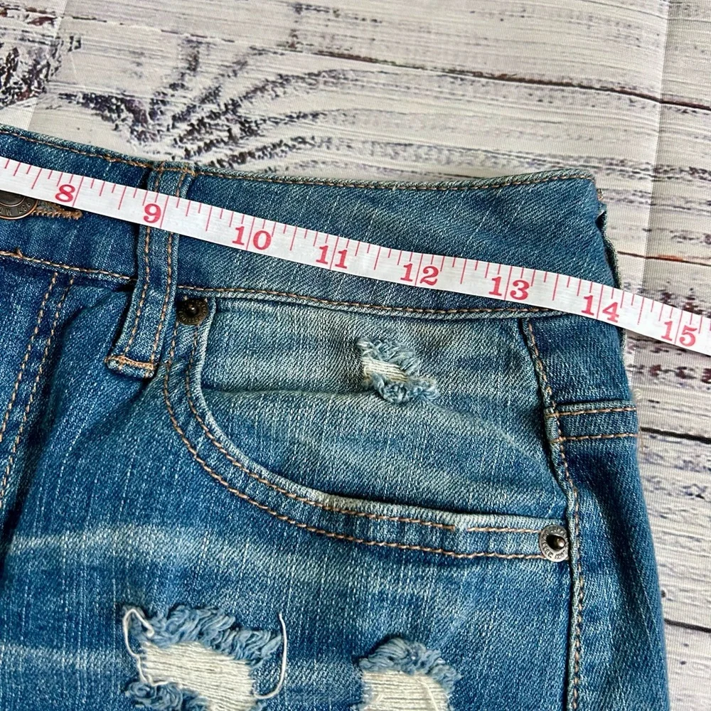 Mossimo Supply Co‎ Distressed Denim Mini Skirt Medium Wash Raw Hem Size 4/27